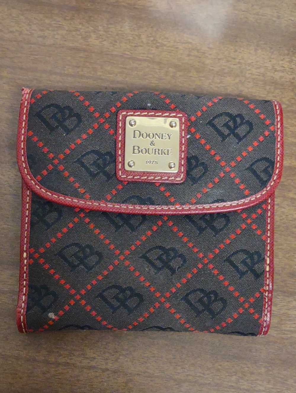 Dooney & Bourke Vintage Dark Gray Wallet with Red Trim and Gold Plate